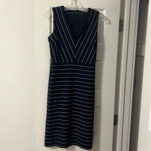 Navy Sleeveless dress. Looks great with a jacket.